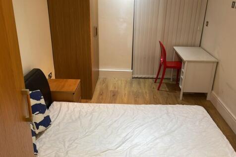 Bright and inviting double bedroom featuring a ...