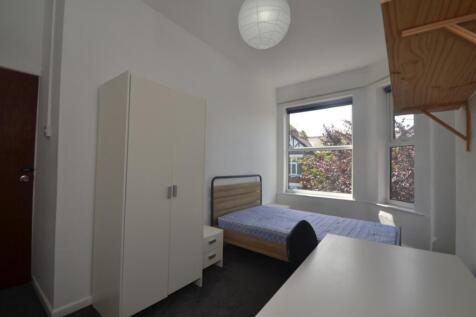 Bright and inviting double bedroom featuring a ...