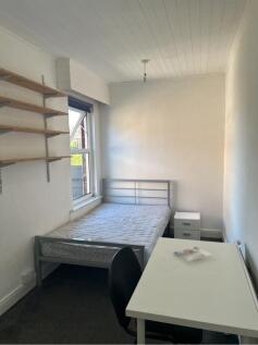 Bright and inviting double bedroom featuring a ...