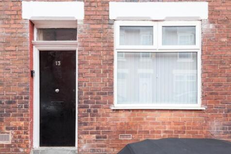 Charming exterior view showcasing a classic bri...