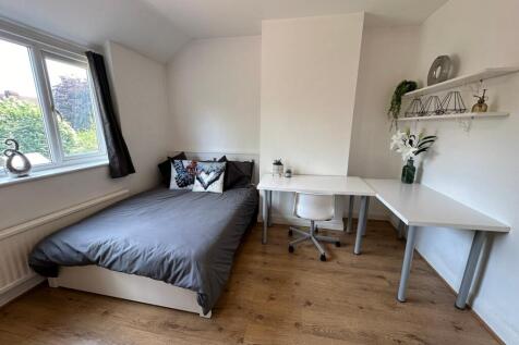 Bright and inviting double bedroom featuring a ...