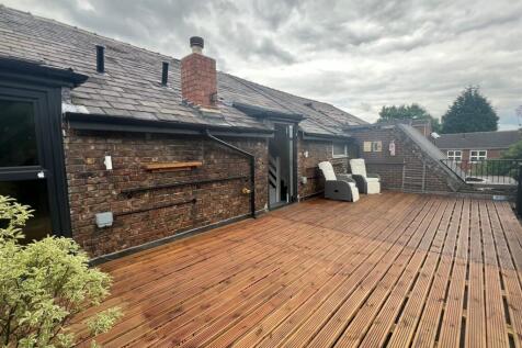 Enjoy a spacious outdoor terrace perfect for re...