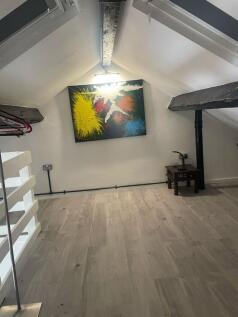 Discover a charming double bedroom featuring mo...