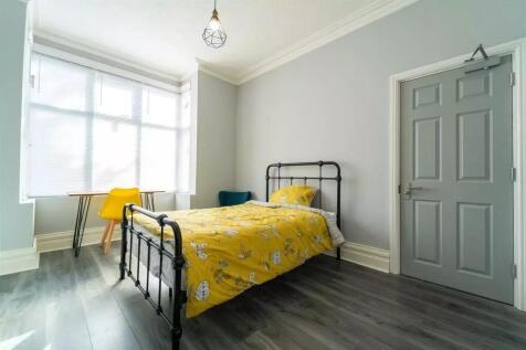 Bright and inviting double bedroom featuring a ...