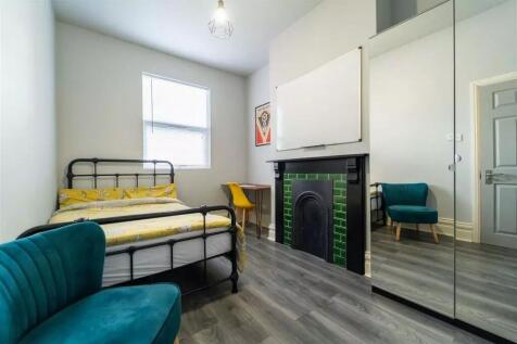 Bright and inviting double bedroom featuring a ...