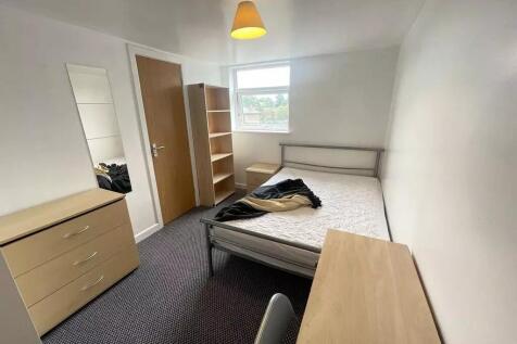 Bright and inviting double bedroom featuring a ...