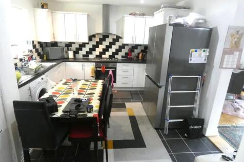 Bright and spacious kitchen featuring modern ap...