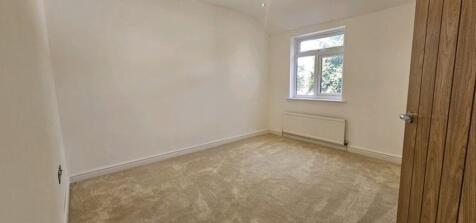 Bright and inviting double bedroom featuring a ...