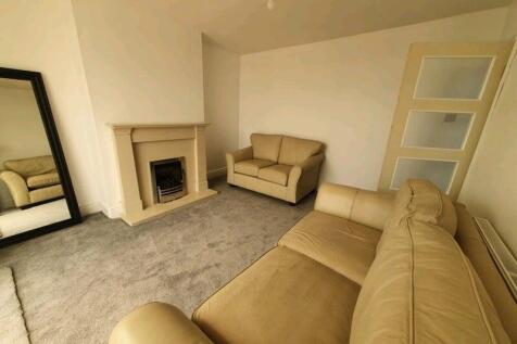 A comfortable and inviting living room featurin...