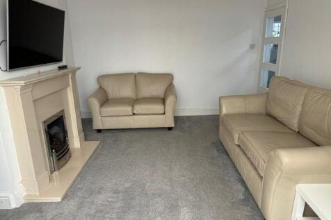 Contemporary living room featuring comfortable ...