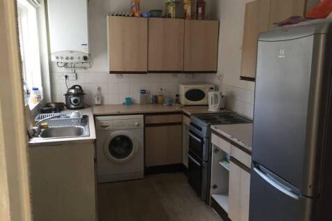 Compact kitchen with ample cabinetry, modern ap...