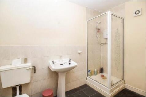 A well-maintained bathroom featuring a modern s...
