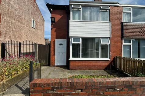 A charming semi-detached brick house featuring ...