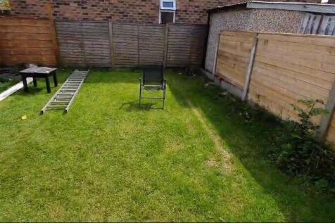 A well-maintained private garden space with lus...