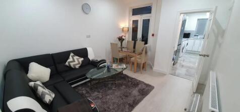 This stylish living room boasts modern furnishi...