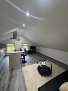A stylish and contemporary living area featurin...