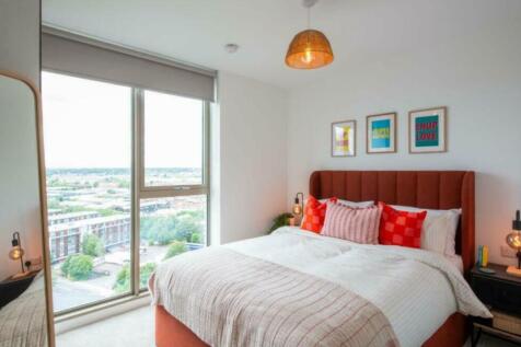 A spacious and well-lit large double bedroom wi...