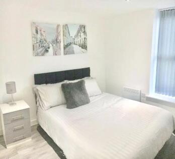Bright and inviting double bedroom featuring a ...