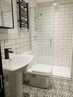 A fresh and modern bathroom featuring stylish p...