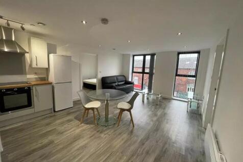 A modern and bright open-plan living room with ...