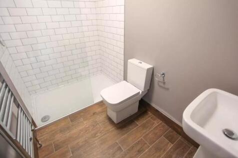 A modern and well-maintained bathroom featuring...