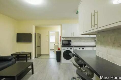 A modern, well-maintained living space featurin...