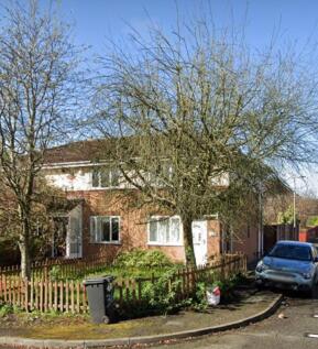 A charming semi-detached house with a neat fron...