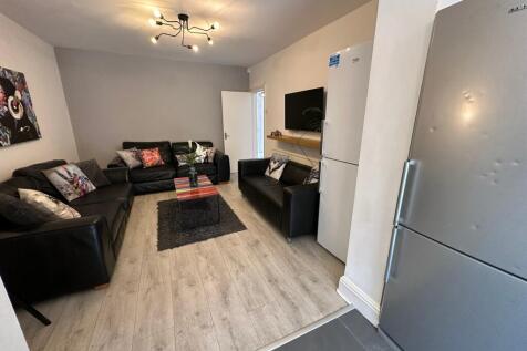Spacious and inviting living room perfect for r...