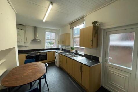 Bright and functional kitchen featuring ample c...