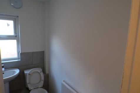 This well-maintained single toilet features a m...