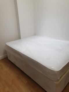 A cozy double bedroom featuring a brand new mat...