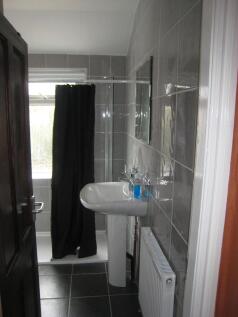 This stylish bathroom features contemporary fix...