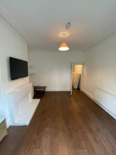 A spacious and bright living room, perfect for ...