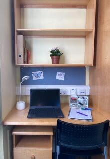 A tidy and well-organized study area with a des...