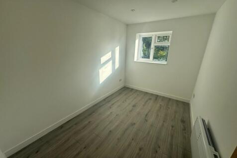 Bright room with a clean, minimalistic design f...