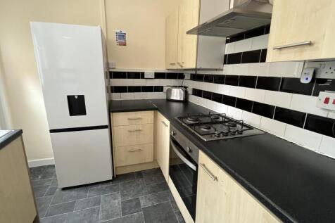 Modern kitchen featuring a gas hob, built-in ov...