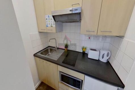Compact and efficient kitchen space featuring m...