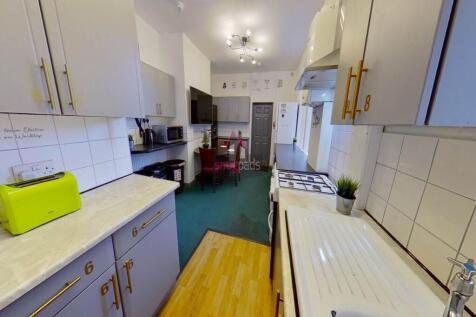 Bright and functional kitchen featuring ample c...