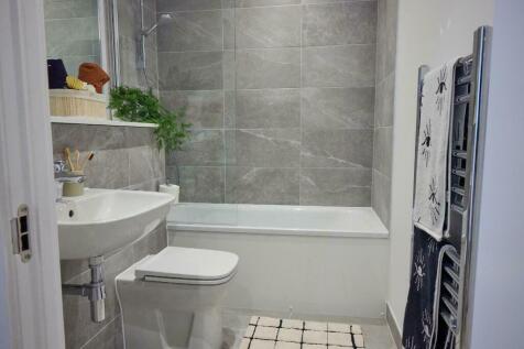 A modern and well-maintained bathroom featuring...