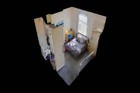 A spacious master bedroom featuring a large dou...