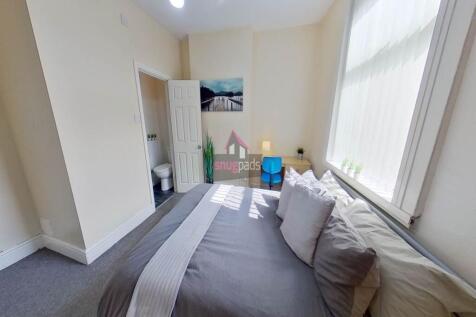 Bright and inviting double bedroom featuring a ...