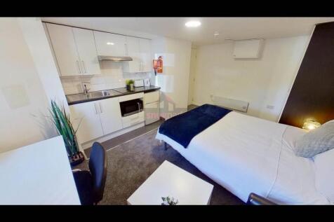 A bright and modern living space with a comfort...