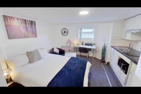 Bright and inviting living room featuring a com...