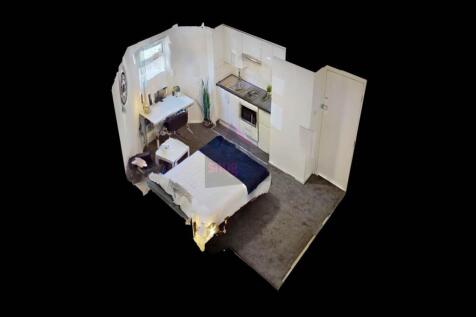 A bright and inviting double bedroom featuring ...
