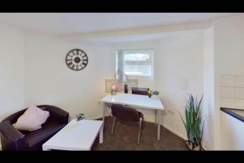 Bright and welcoming living room with a comfort...