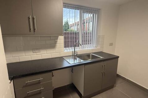 Modern kitchen with ample counter space and a l...
