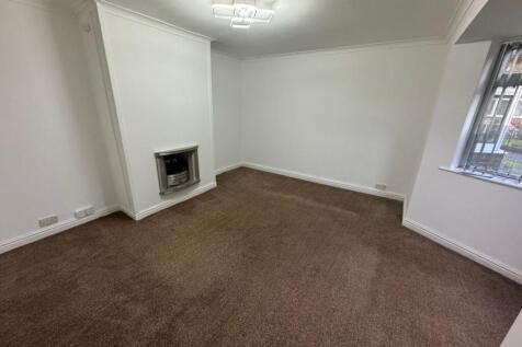 Bright and spacious master bedroom featuring a ...