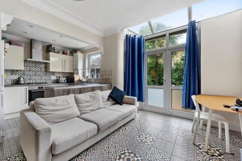 Bright modern kitchen with contemporary cabinet...