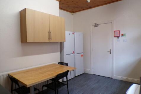 A straightforward kitchen area featuring a smal...