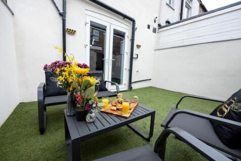 A beautifully arranged garden area, perfect for...